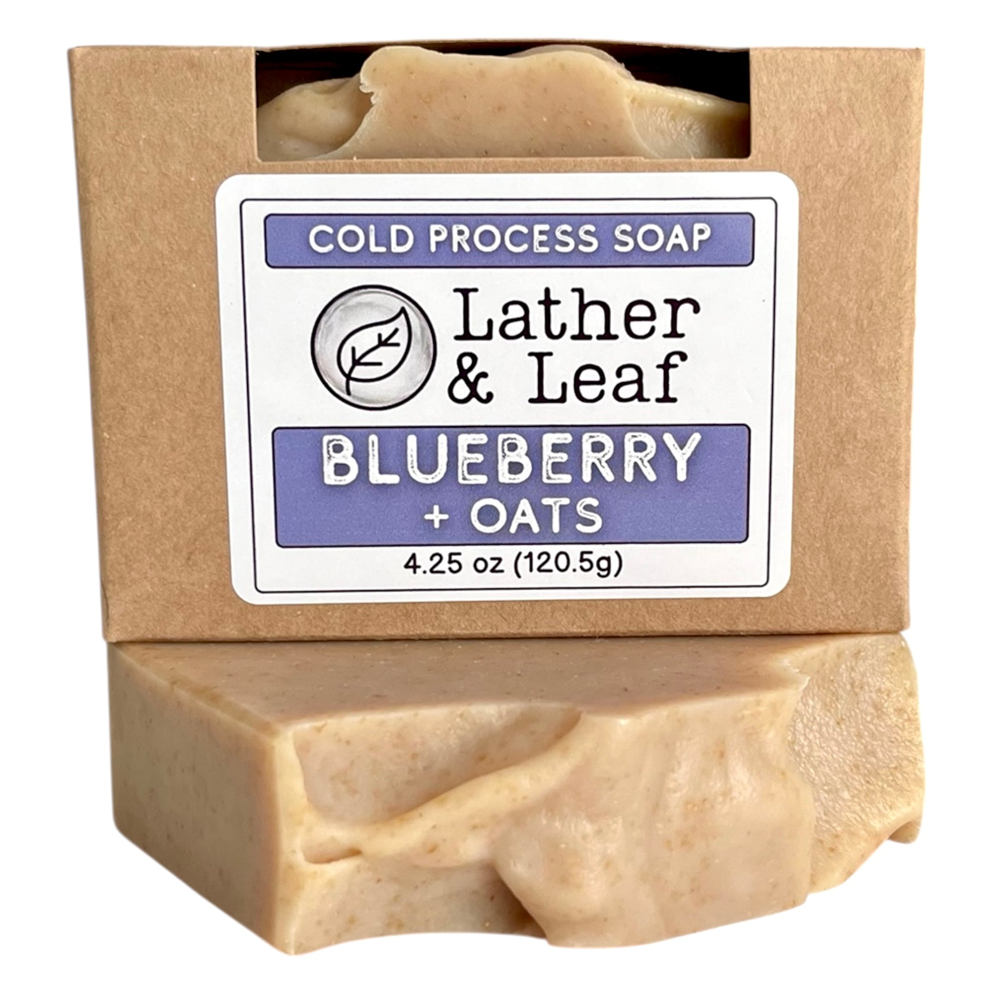 Bar of blueberry and oats soap in a box  with 'Lather & Leaf' label on a white background