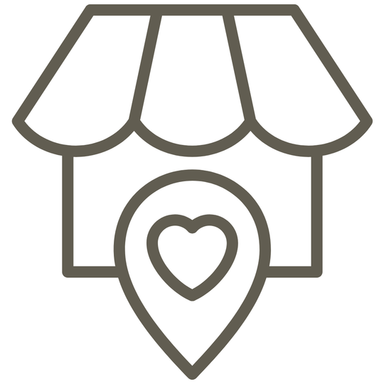 Icon of a heart symbol inside a location pin with an awning above on a white background