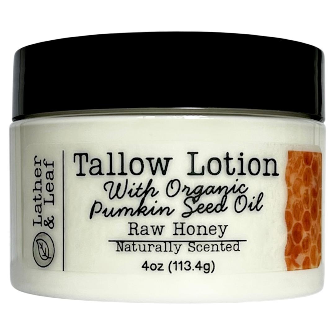 Tallow lotion jar with black lid and label on a white background