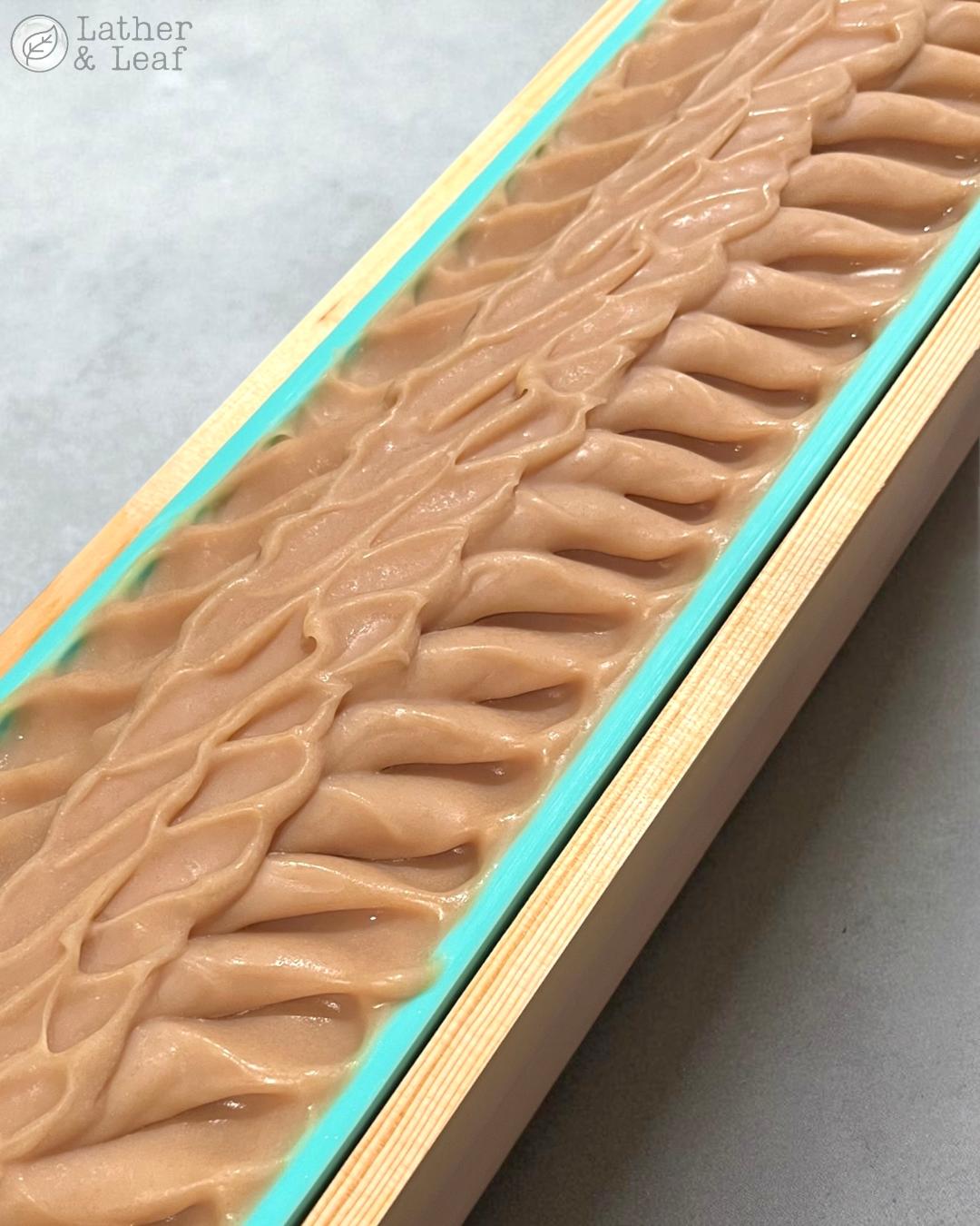 Triple milk and tallow soap loaf uncut with pretty textured top